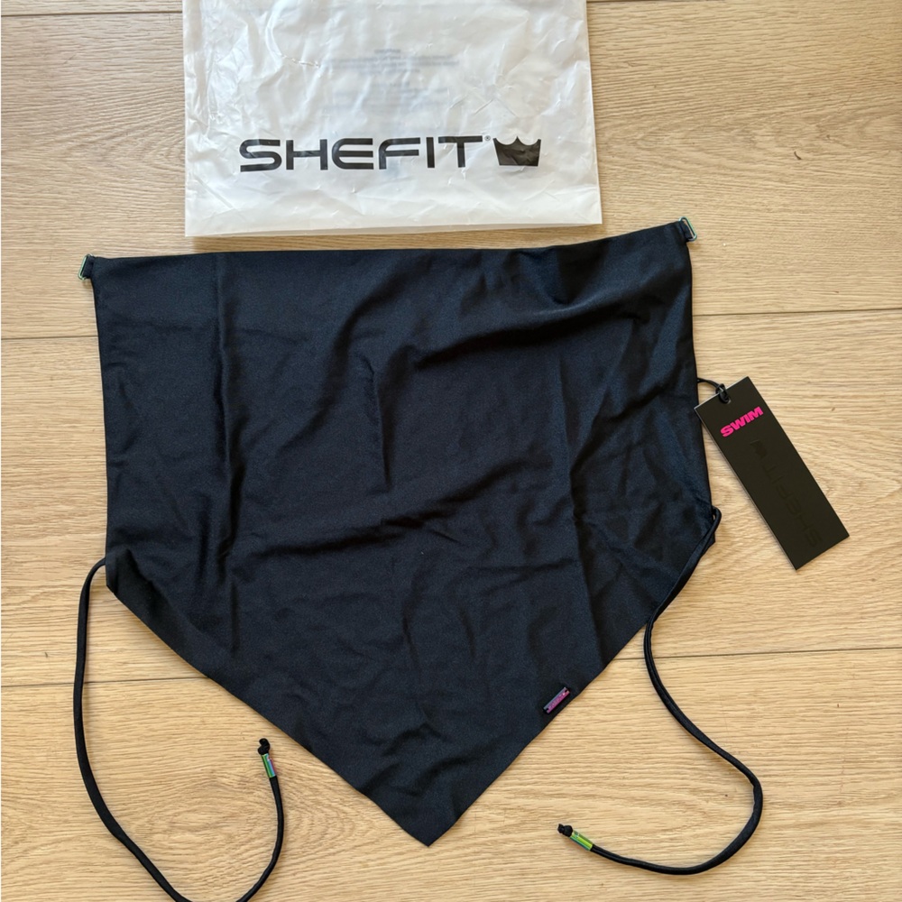 SHEFIT Women's Black Swim Top attachment